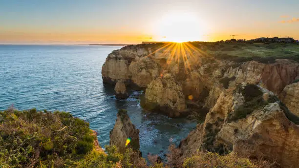 Photo of Sunset over the cliffs and beaches