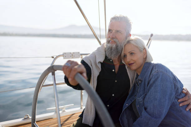 istock Couple enjoying their romantic vacation, sailing the sea 1445031436