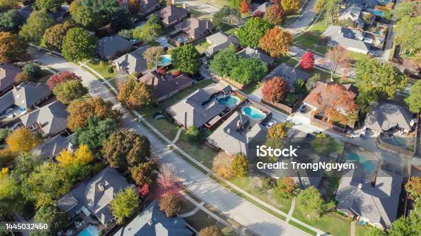 Upscale Single Family Home With Swimming Pool And Colorful Fall Foliage Near Dallas Texas America Stock Photo - Download Image Now