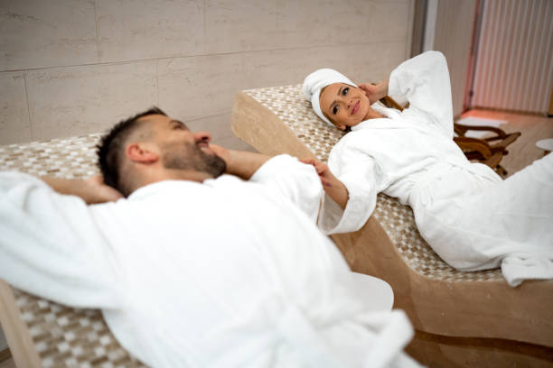 istock Couple in bathrobes at spa 1445033432