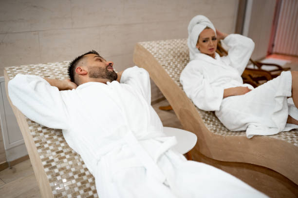 istock Couple in bathrobes at spa 1445033451