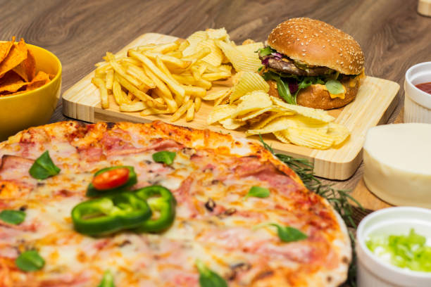 istock Tasty fast food on table 1445035619