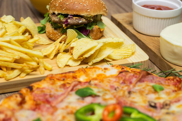 istock Tasty fast food on table 1445035645
