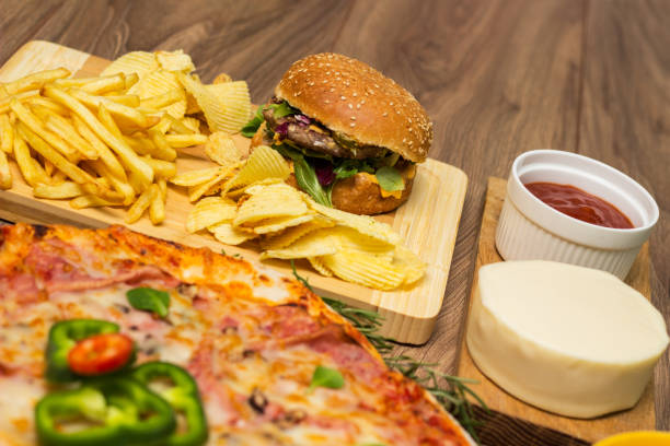istock Tasty fast food on table 1445035685