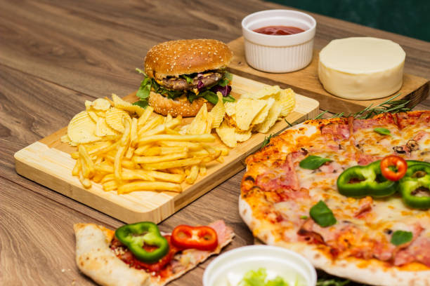 istock Tasty fast food on table 1445035707