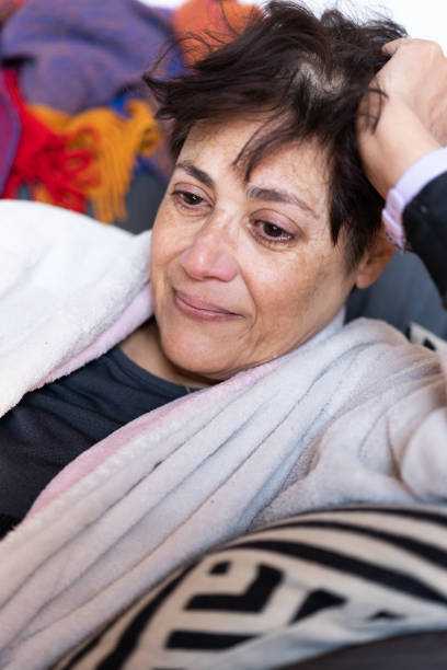 istock woman with depression crying in tears 1445037753