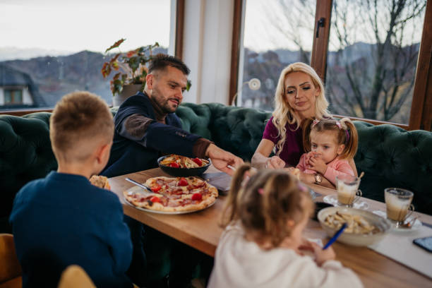 istock Family moments in a restaurant 1445040548