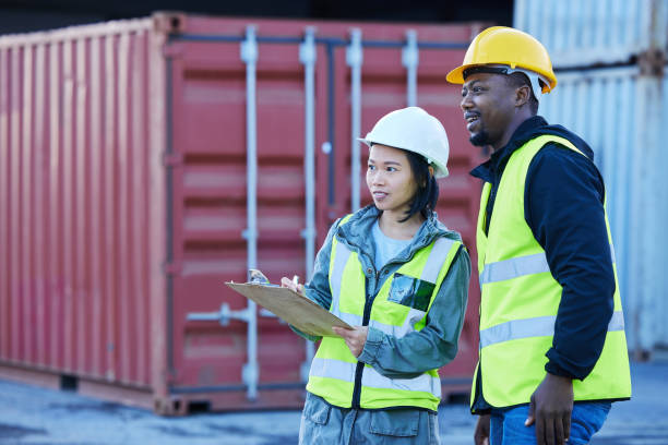 istock Shipping logistics team, manufacturing planning and work collaboration in supply chain, industrial cargo and production inspection. Factory port man, woman and distribution industry freight checklist 1445041296