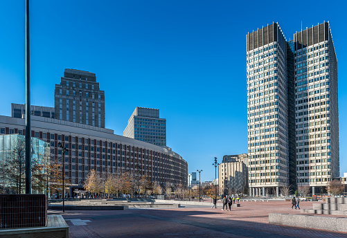 Boston, MA, USA - November 23, 2022: Tourists and locals strolling through City Hall Plaza, in Boston, MA. City Hall Plaza in Boston, Massachusetts, is a large, open, public space in the Government Center area of the city.