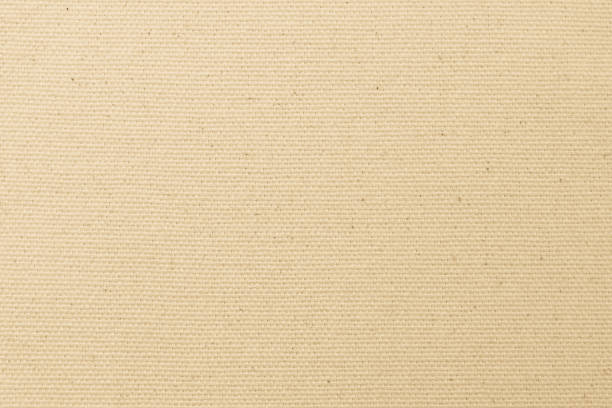 istock Hessian sackcloth woven texture pattern background in light yellow cream brown 1445044498