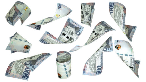 istock 3D rendering of Saudi riyal notes flying in different angles and orientations isolated on white background 1445045716