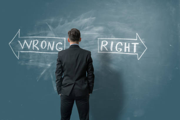 istock Businessman facing a dilemma. 1445048690