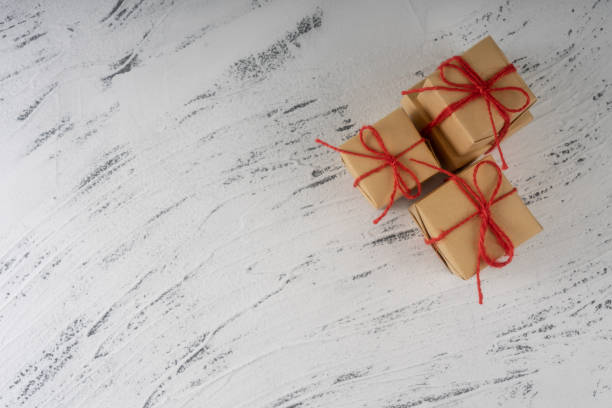 istock Christmas composition. Christmas gifts on cement background. Flat lay, top view, copy space. 1445048749