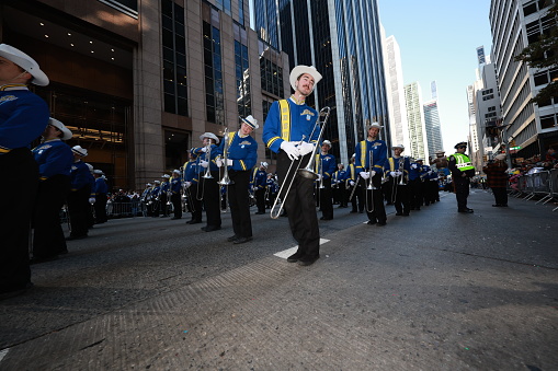 New York, New York - November 24, 2022: The Pride of the Dakotas Marching Band performs during the 96th Macy's Thanksgiving Day Parade in New York, Thursday, November 24, 2022. The band is making its first appearance at our Parade. (Photo: Gordon Donovan)