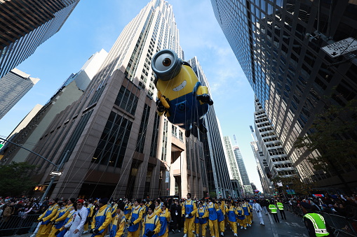 New York, New York - November 24, 2022: The character from Illuminations blockbuster comedy, Minions: The Rise of Gru causes a little mischief as he makes his way down the Parade route for the first time in the 96th Macy's Thanksgiving Day Parade in New York, Thursday, November 24, 2022. (Photo: Gordon Donovan)