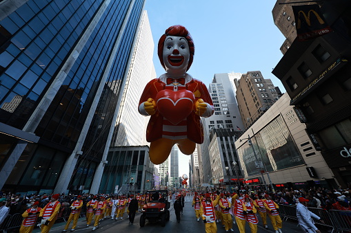 New York, New York - November 24, 2022: The Ronald McDonald balloon shares a heart for the 96th Macy's Thanksgiving Day Parade in New York, Thursday, November 24, 2022. (Photo: Gordon Donovan)