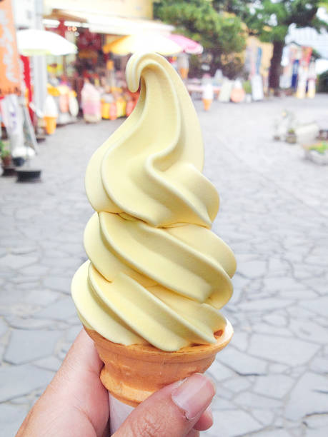 istock Sweet potato soft cream close up in hand 1445055712