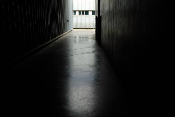 istock Light Beam on Hallway Ground in the Warehouse. 1445060609