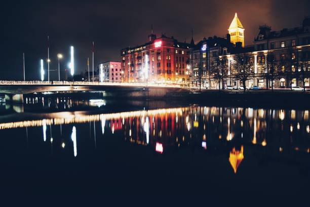 istock View of illuminated bridge in city at night 1445066011
