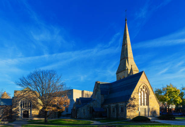 Cambridge, Massachusetts, USA - November 26, 2022: Lesley University and Episcopal Divinity School Brattle Campus. Lesley University is a private university in Cambridge. St. John's Memorial Chapel on Brattle Street. Built in 1867.
