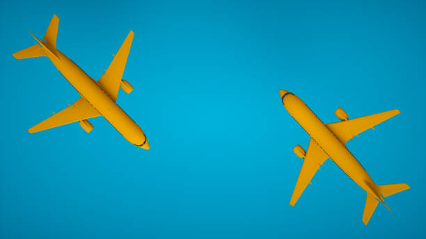 istock Realistic 3D rendering airplane. Two yellow aircraft on blue background, top view. 1445067580