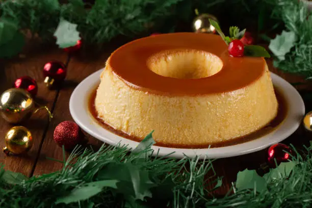 Pudding de leche, a delicious Brazilian pudding, with milk and condensed milk, topped with caramel sauce. (It's a kind of vanilla pudding). Served at Christmas dinner. christmas dessert