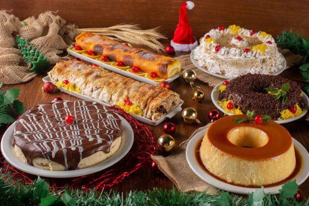 Assorted desserts and sweets for the Christmas party. Christmas dinner table front scene