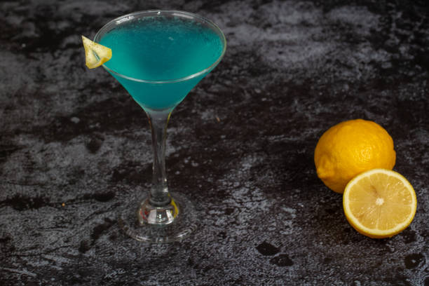 istock Blue Lagoon alcohol cocktail on concrete background 1445077454