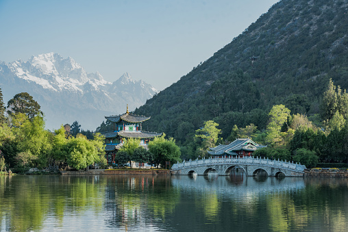 Travel China, Black Dragon Pool Landscape, a famous pond in the scenic Jade Spring Park located at the foot of Elephant Hill, a short walk north of the Old Town of Lijiang in Yunnan province.