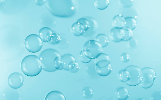istock Abstract Beautiful Transparent Blue Soap Bubbles Background. Freshness Soap Sud Bubbles Water. 1445080775
