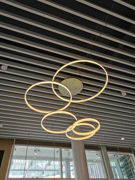 istock Interior modern light hang in shopping mall ceiling. Selective focus. 1445083233
