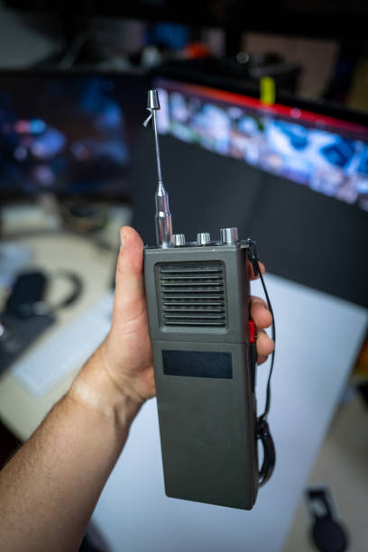 istock an old military radio is held in one hand 1445083273