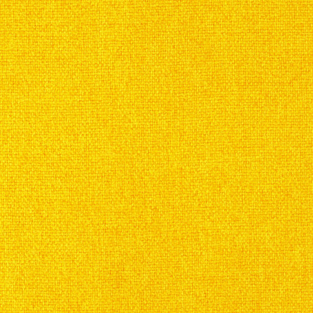 istock Yellow golden fabric cloth texture background, seamless pattern of natural textile. 1445087430