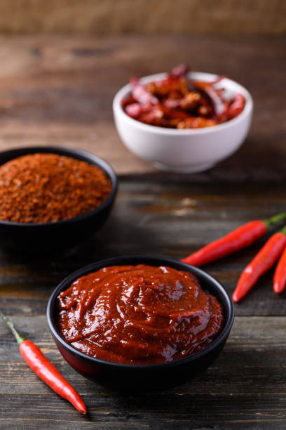 istock Korean gochujang (red chili paste) in bowl on wooden background 1445096312