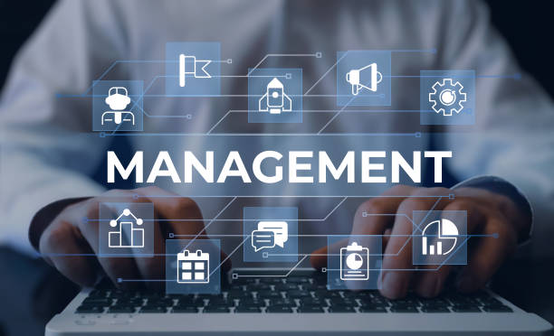 istock Business management closeup concept image with white glyph icons 1445099051