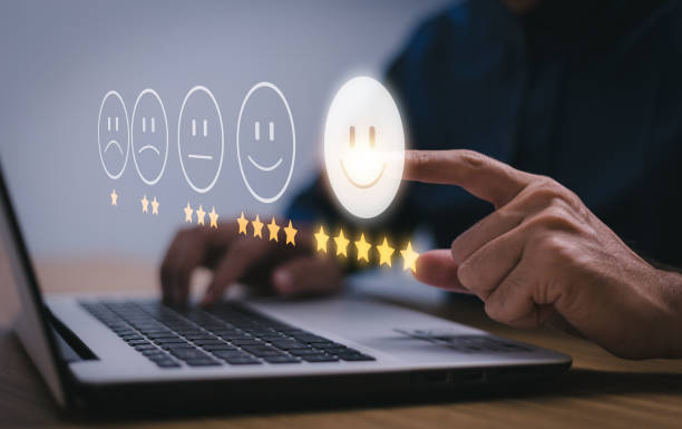 istock Customer service and Satisfaction concept, Business people touching the virtual screen on the happy Smiley face icon to give satisfaction in service. rating very impressed. 1445102338