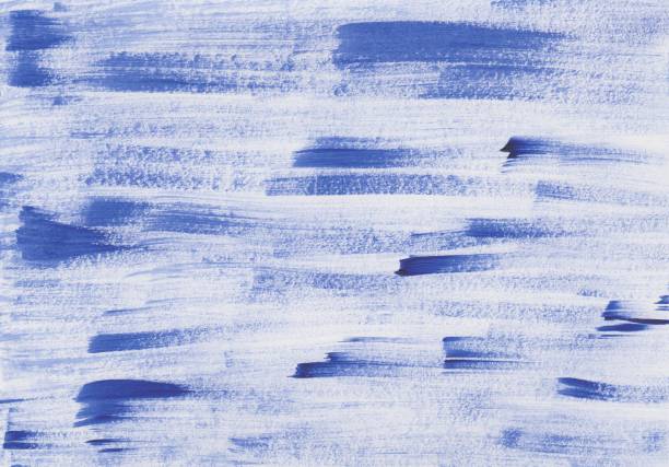 istock Uneven brush strokes with acrylic paint in blue 1445111127