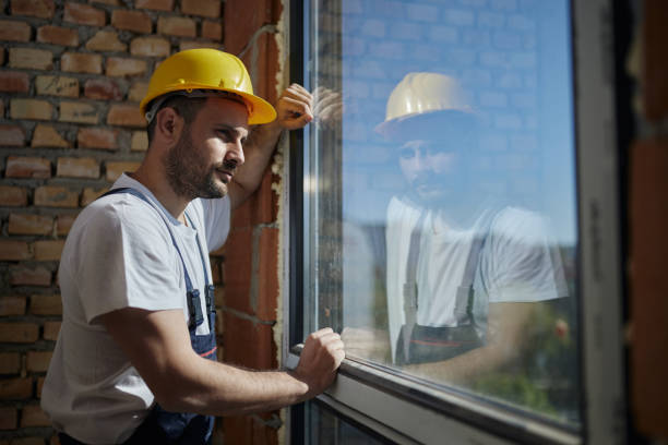 istock Manual worker day dreaming by the window at construction site. 1445111134