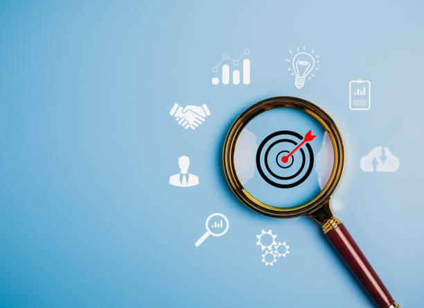 magnifier glass focus to target dartboard, business development strategy and action plan concept with icon business strategy and action plan, search, goal, strategy, success - aspirações imagens e fotografias de stock