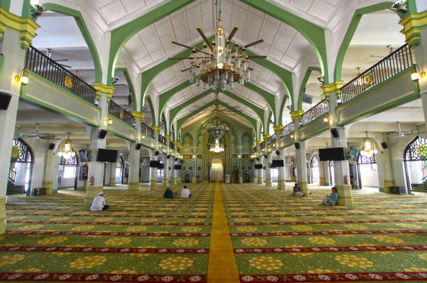 Masjid Sultan Mosque in the Kampong Glam district of Singapore. View of the interior of the Masjid Sultan Mosque in the Kampong Glam district of Singapore. sultan stock pictures, royalty-free photos & images