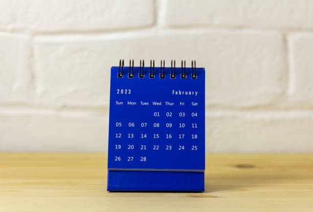 istock Desktop calendar for February 2023 on a light background., 1445122816