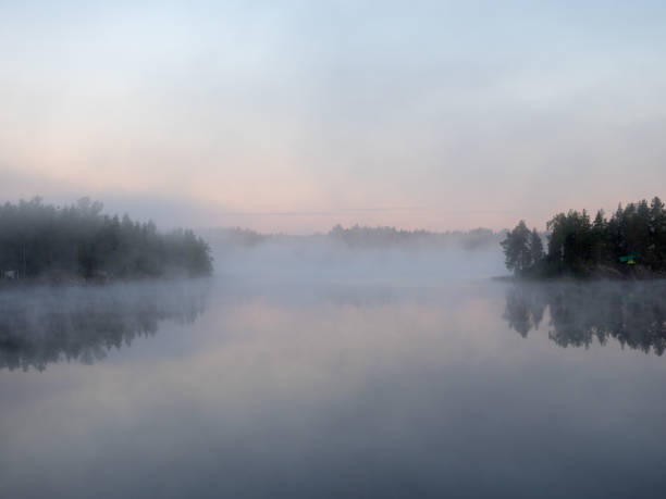 istock landscape with morning mist over lake 1445123886