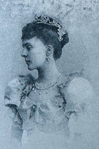 istock Young beauty from Vienna, side view, with necklace and crown 1445124721