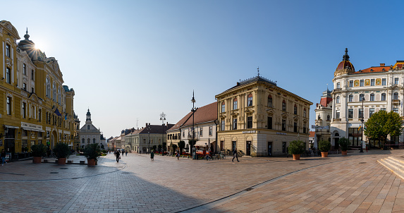 Pecs, Hungary - 13 October, 2022: downtown Pécs and the Szechenyi Square with a sunburst