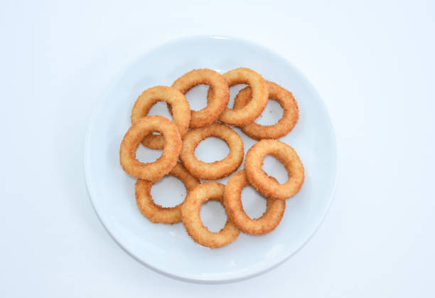 istock fried onion rings on white plate, isolated on white background 1445124894
