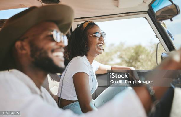 Travel Road Trip And Black People Couple Driving By Countryside For Holiday Journey And Freedom With Happiness Trendy Sunglasses Fashion And Gen Z Friends In A Car Drive For Vacation Lifestyle Stock Photo - Download Image Now