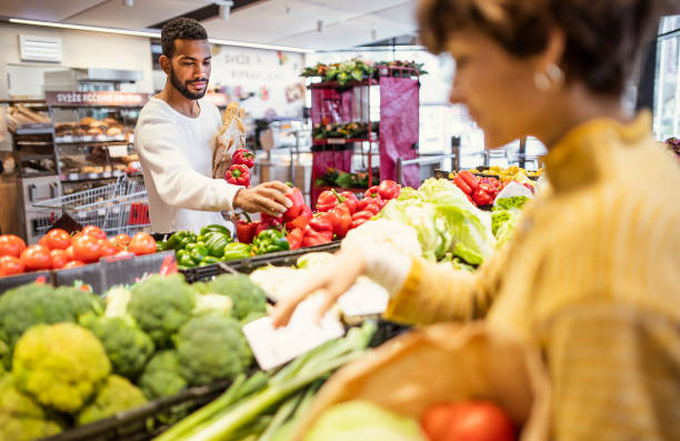 istock Two people shopping in the supermarket 1445128242