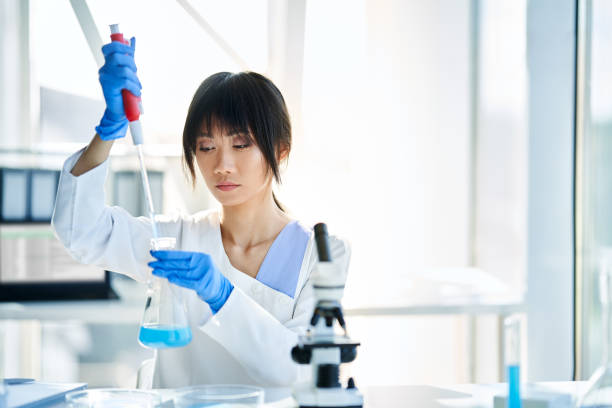 istock Asian scientist working in big modern laboratory doing some research 1445128640