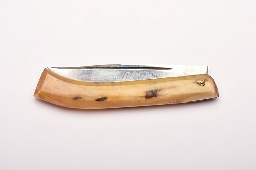 Hunting knife on the white background
