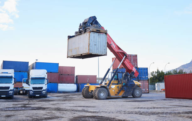 istock Logistics industry, forklift shipping container for distribution truck and supply chain export in Canada. International transportation for ecommerce, industrial global trade and cargo freight service 1445133134
